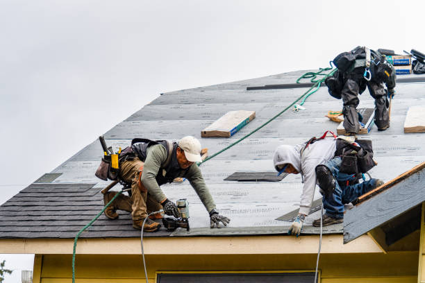 Professional Roofing technician working in Waterford, CT